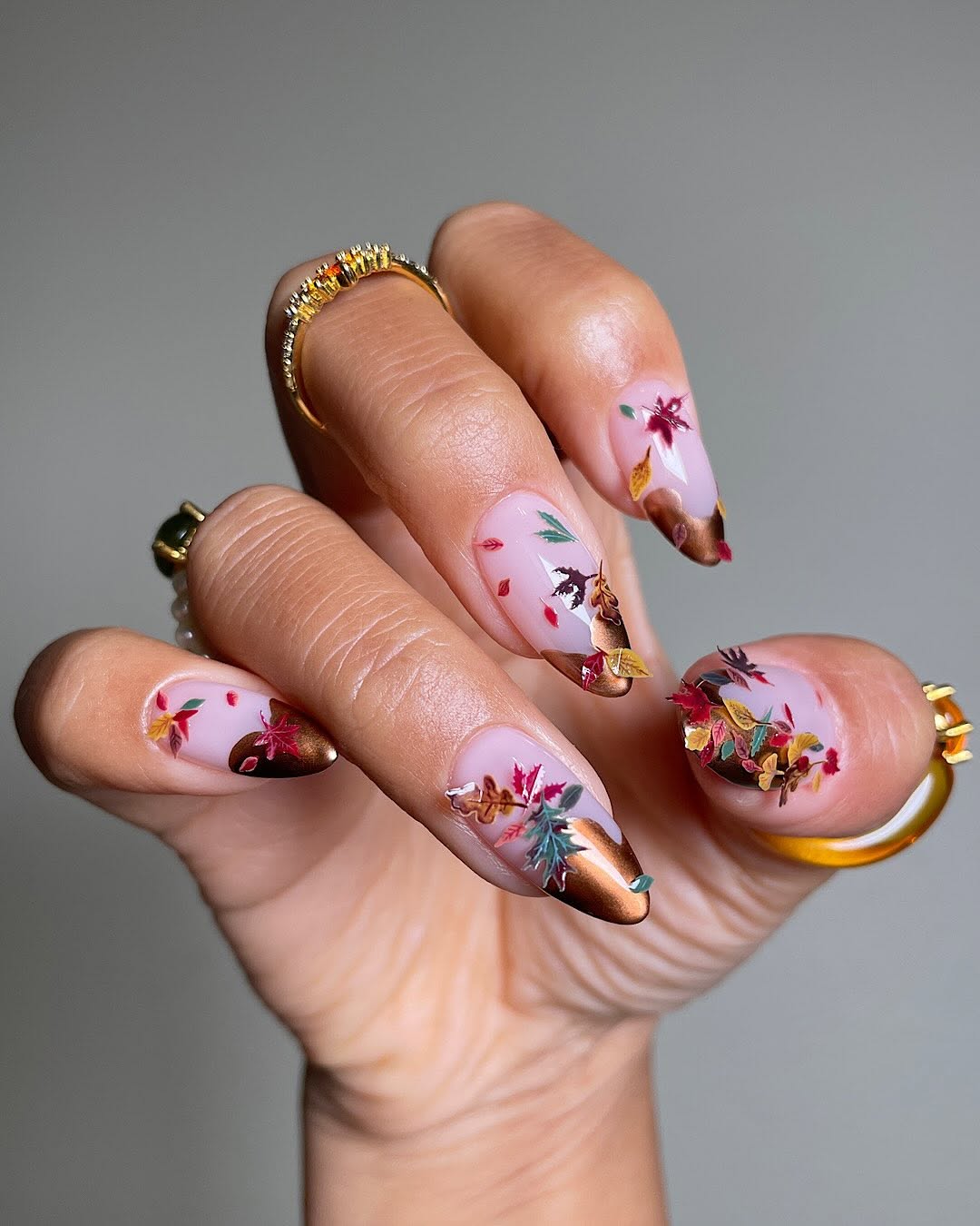 Long Almond Nails with Metallic Brown Tips and Leaf Art Long Almond Nails with Metallic Brown Tips and Leaf Art — Brown Almond Nails