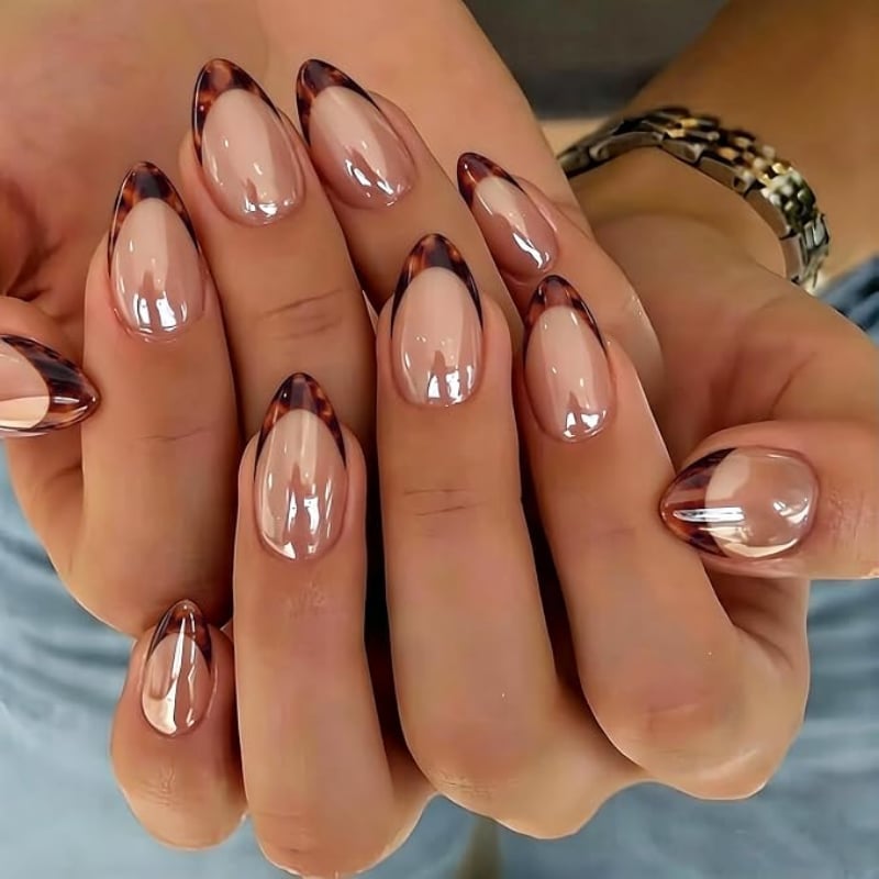 Shimmering Rich Brown Chrome Medium Oval Nails, Against A Soft — Brown Chrome Nails
