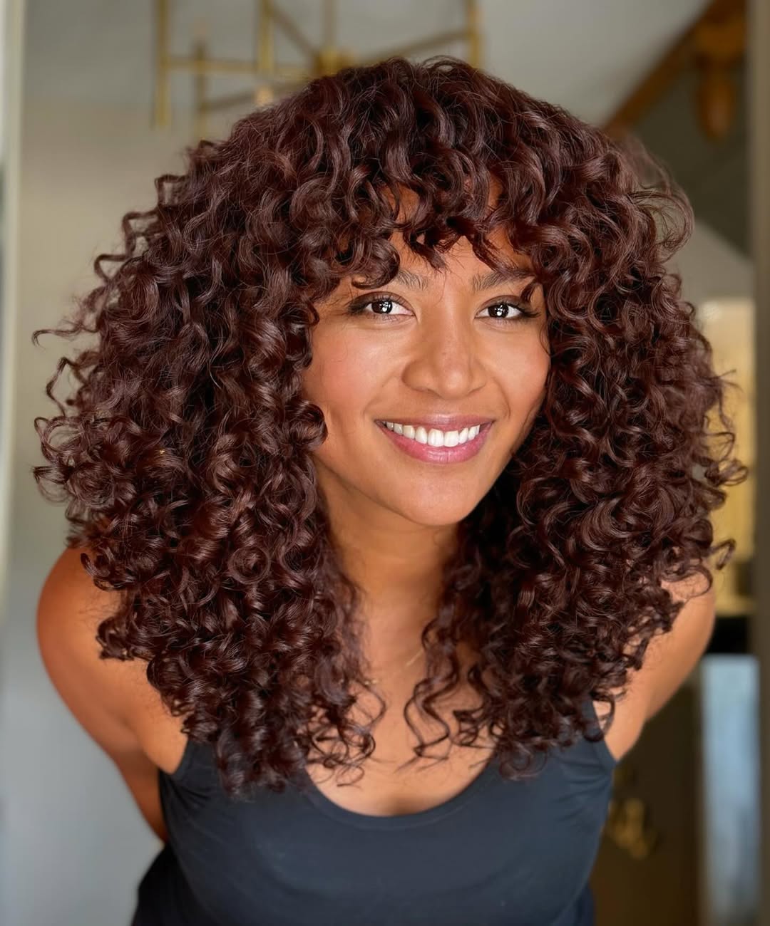 Collarbone Brown Curly With Curtain Bangs — Brown Curly Hair