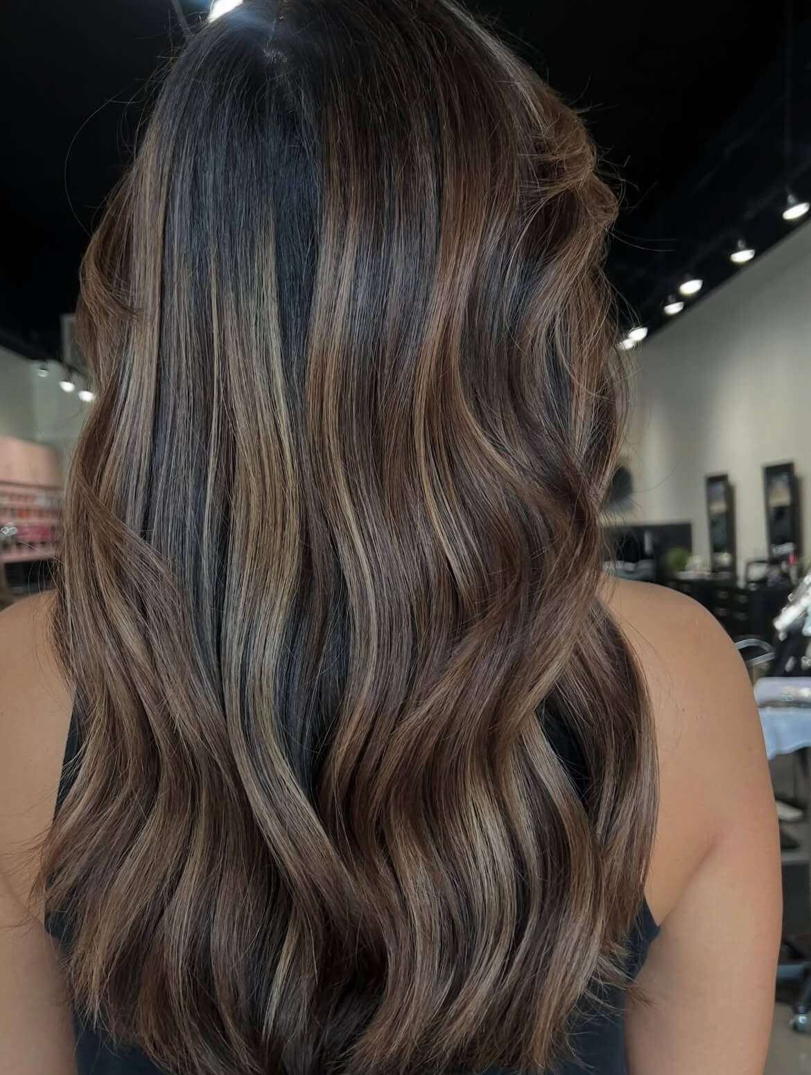 Mid-Back Dark Brown With Caramel Highlights and Showcasing A Thick — Brown Highlights