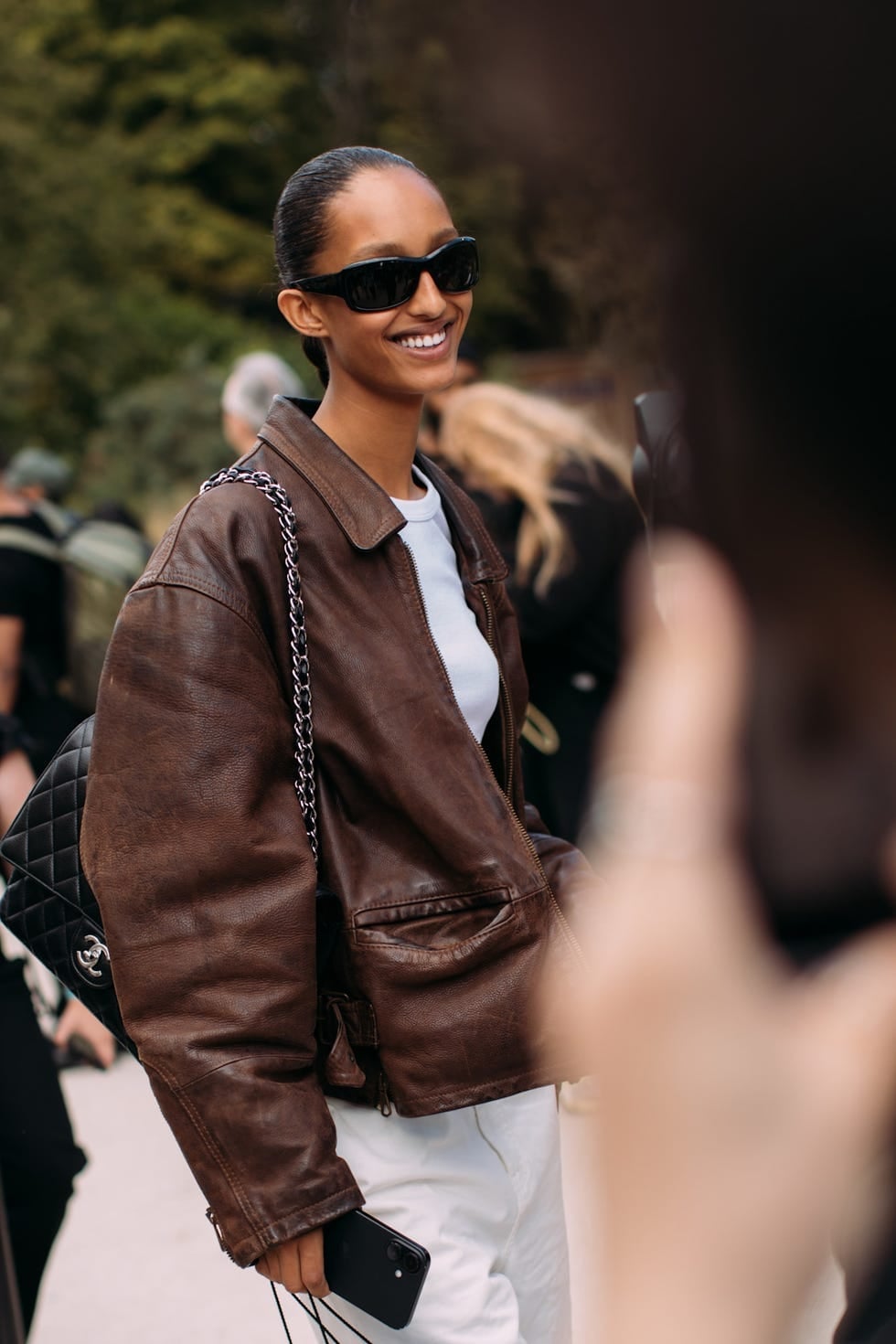 Oversized Brown Leather Bomber Jacket with White, Close-Up Take Oversized Brown Leather Bomber Jacket with White, Close-Up Take — Brown Jacket Outfit