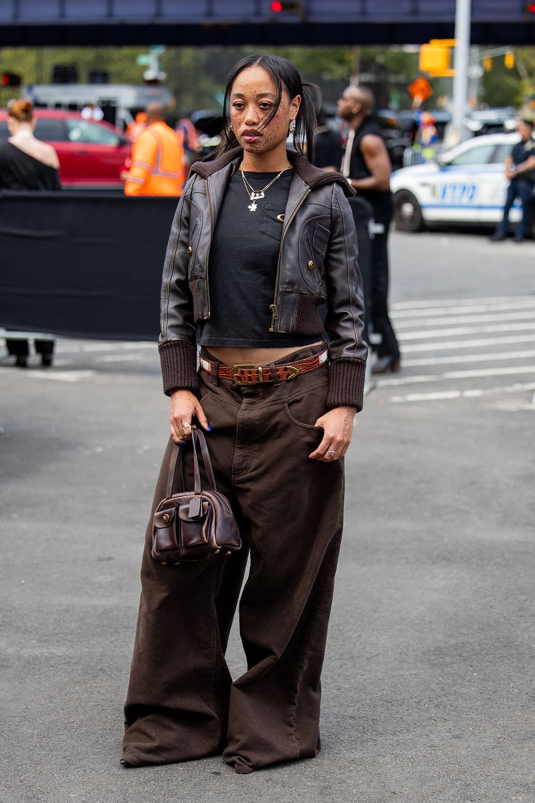 Oversized Brown Jeans with a Black Crop Top and Leather Jacket — Brown Jeans Outfits
