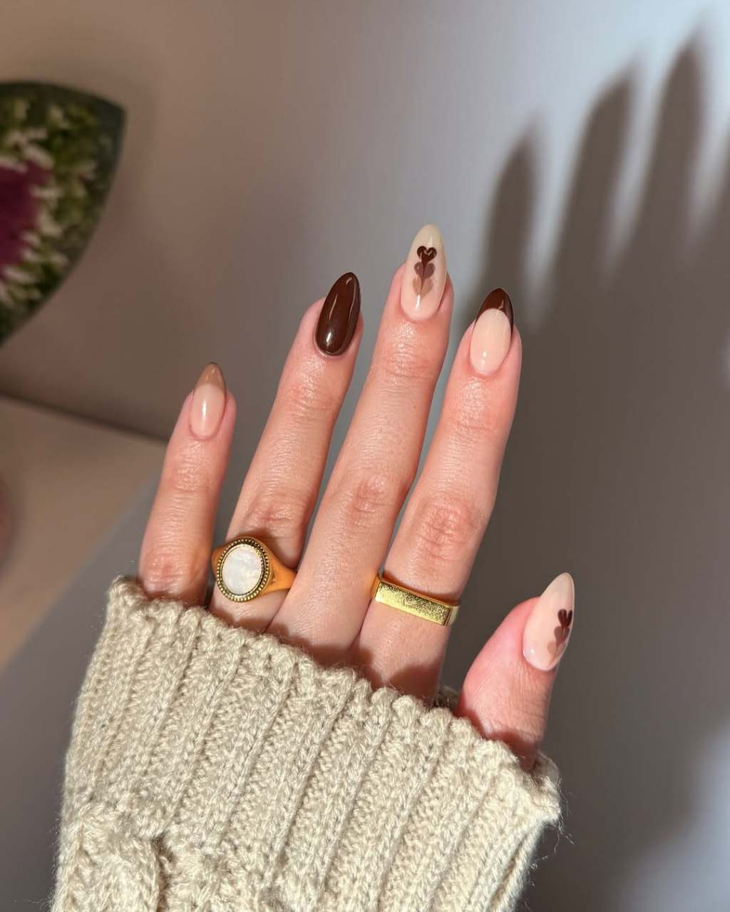 Glossy Brown Leopard Print French Oval Nails, Close-Up Take — Brown Nails
