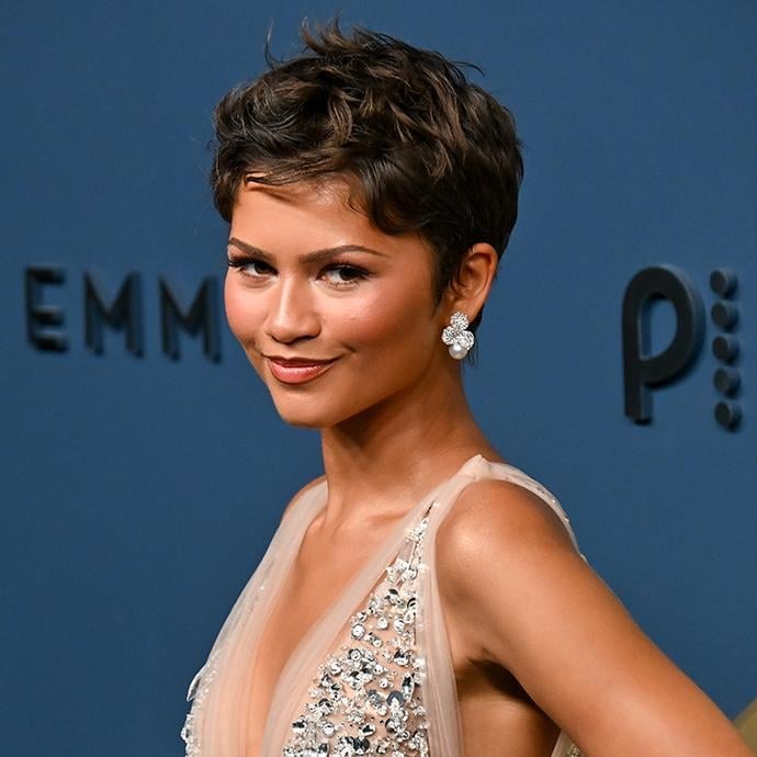 Dark Brown Pixie With Wispy Bangs and Middle Part