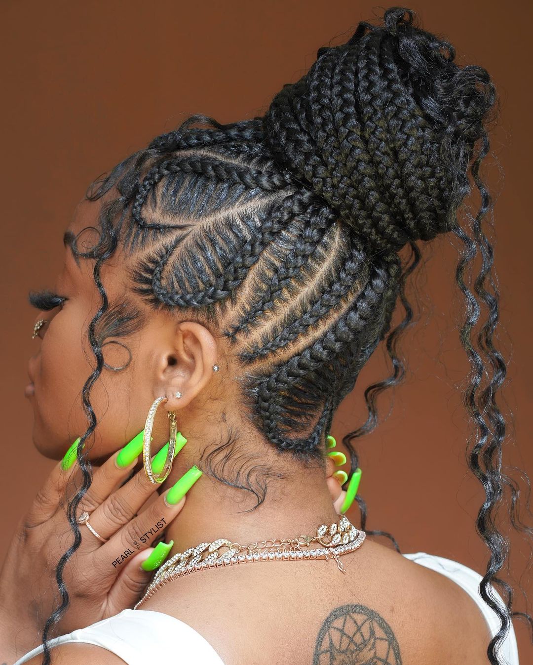 Thick Braided Bun With Intricate Cornrows Thick Braided Bun With Intricate Cornrows — Bun Braids