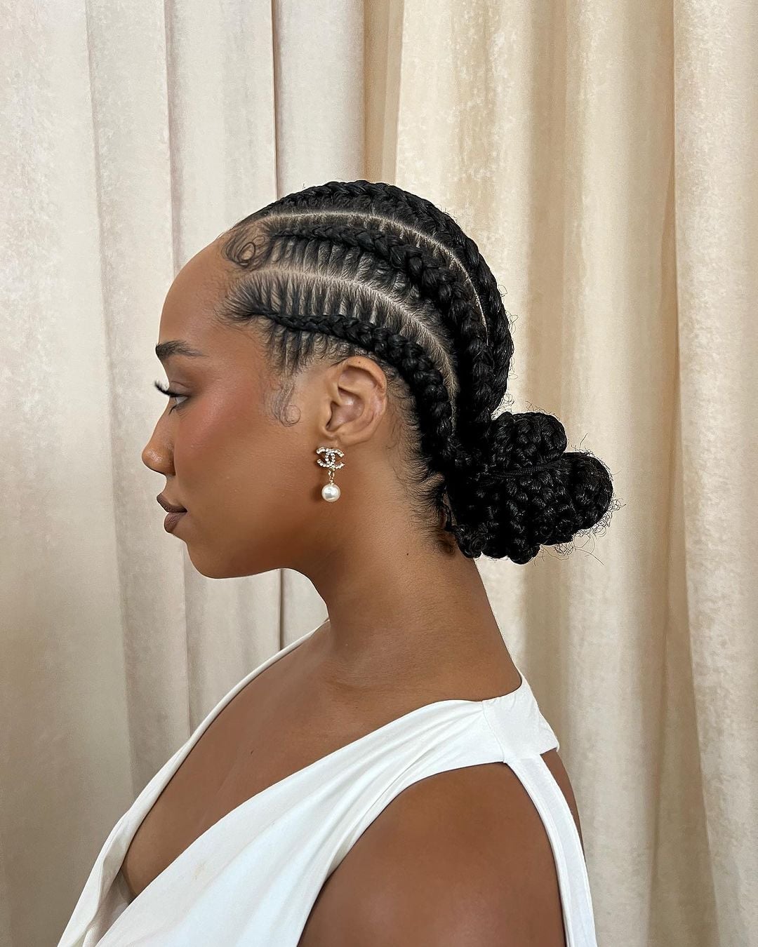 Low Textured Braided Bun With Stitch Braids Low Textured Braided Bun With Stitch Braids — Bun Braids