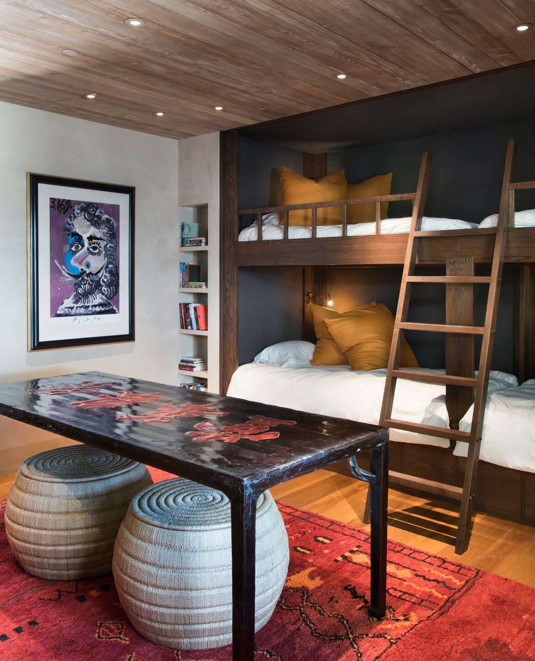 Dark Wood Bunk Bed with Vibrant Rug and Woven Seating Dark Wood Bunk Bed with Vibrant Rug and Woven Seating — Bunk Bed Ideas