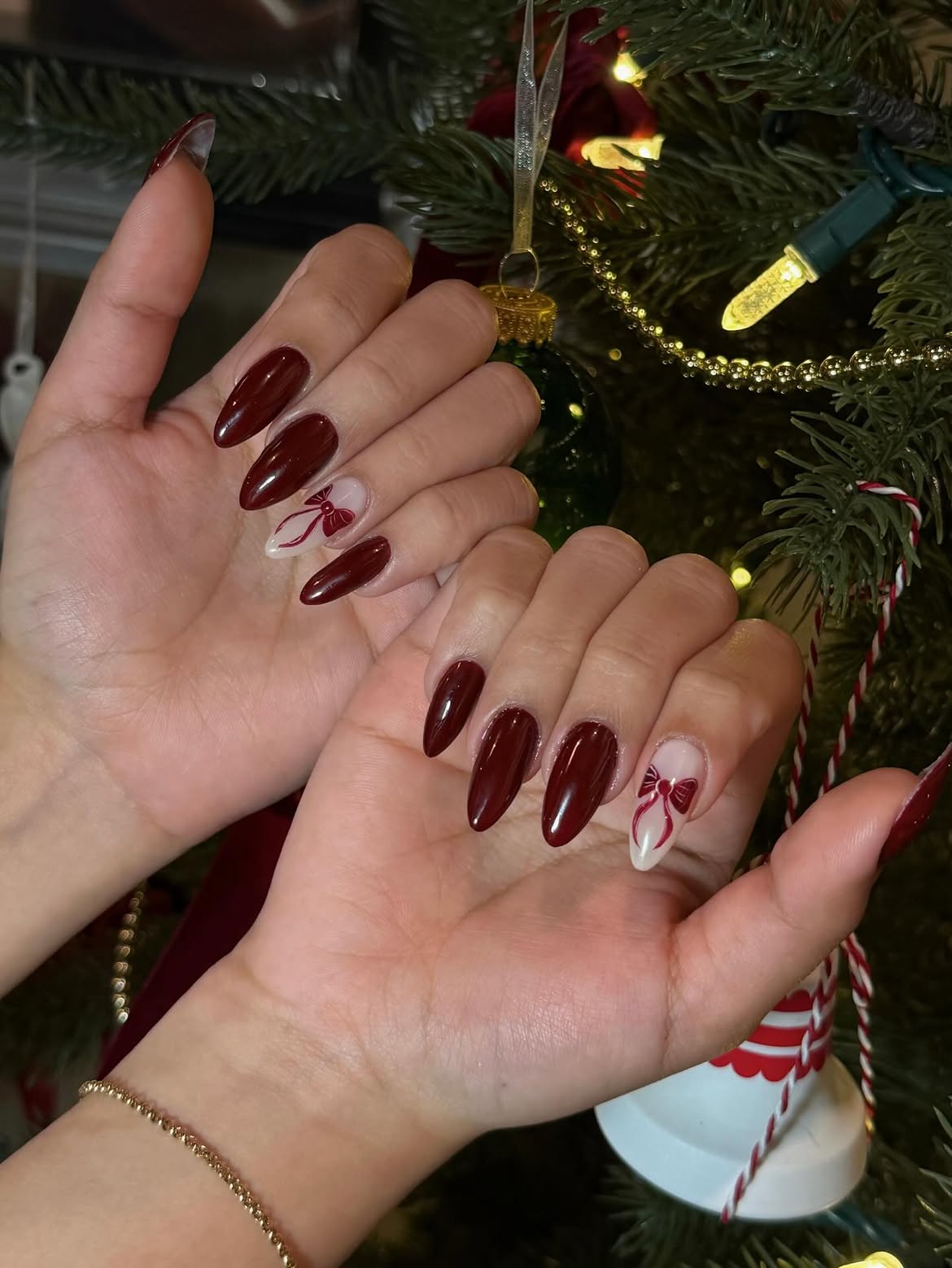 Burgundy Bow Accent Almond Nails