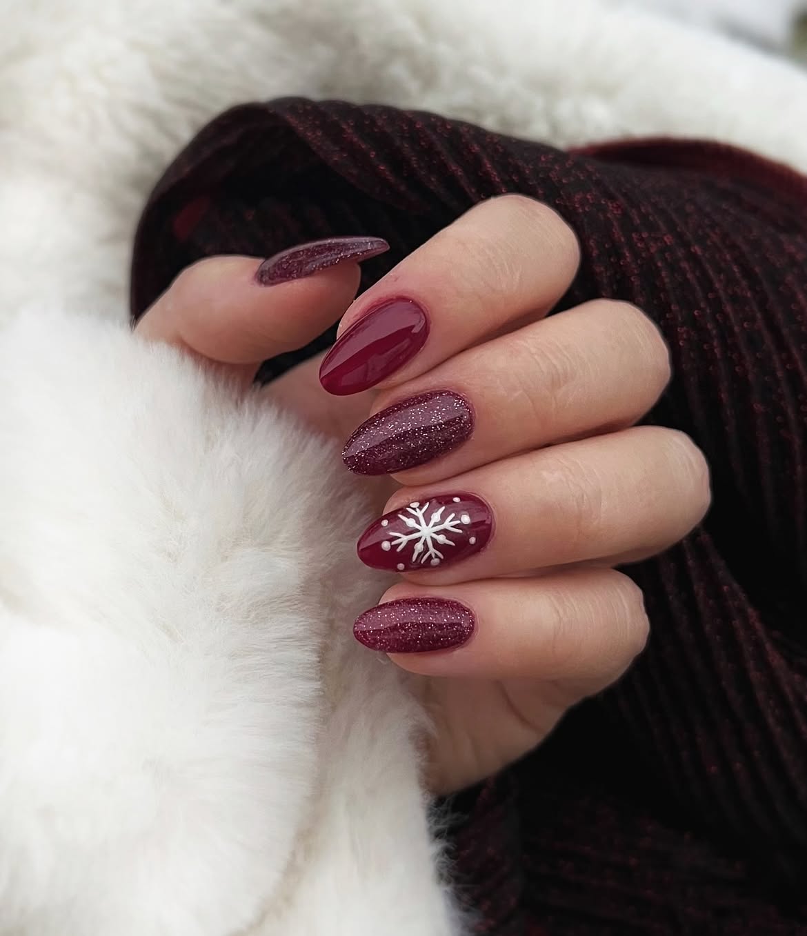 Burgundy Glitter Snowflake Almond Nail Design