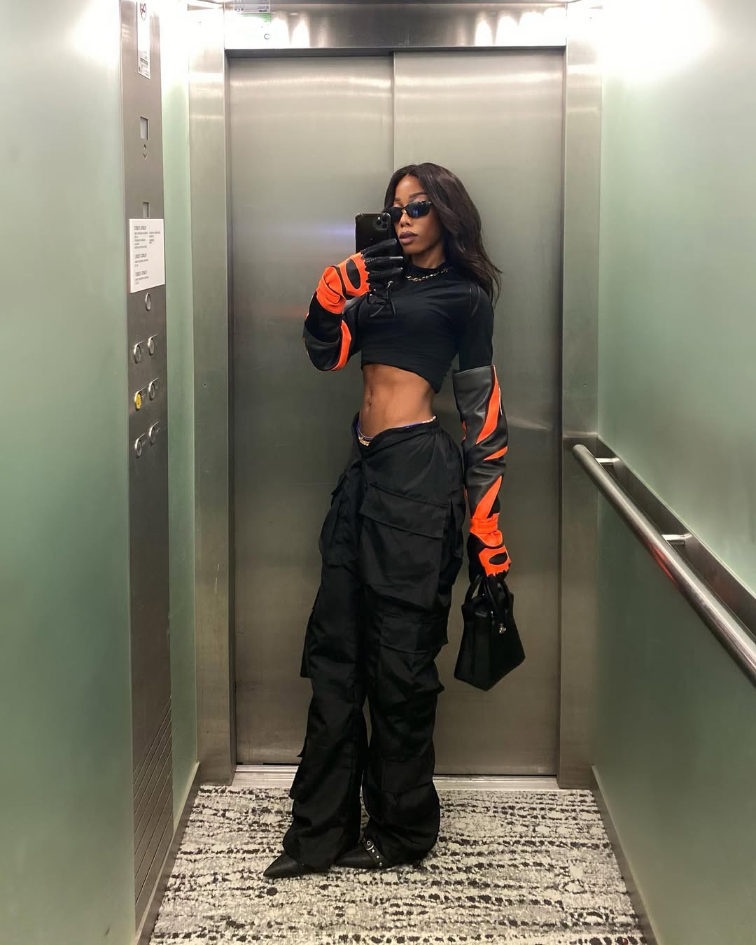 Black Low-Rise Cargo Pants with Orange Panel Top and Heels Black Low-Rise Cargo Pants with Orange Panel Top and Heels — Cargo Pants Outfits