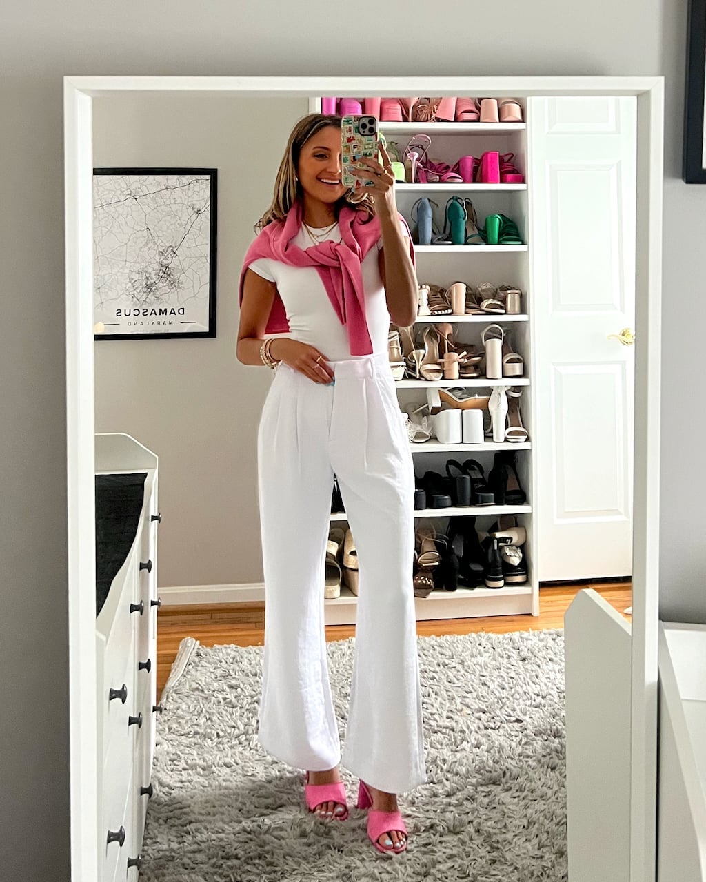 Gray Pinstripe Blazer Over Blue Jeans and White Top With Straight Leg — Casual Office Outfit