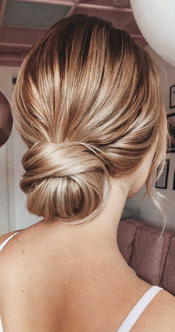 Sleek Ash Blonde Low Bun Face-Framing Pieces — Casual Updo