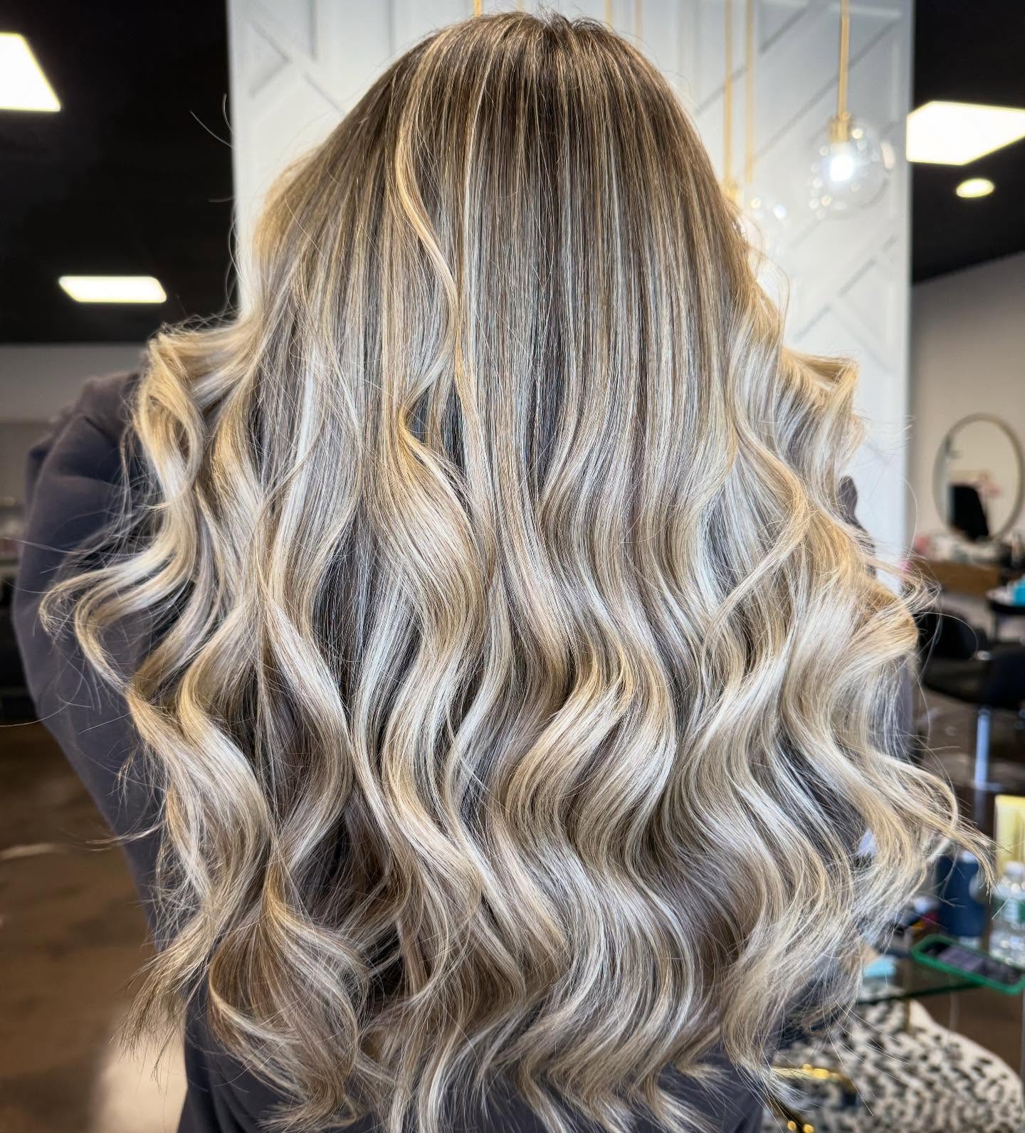 Champagne Blonde Waves With Face Framing Layers