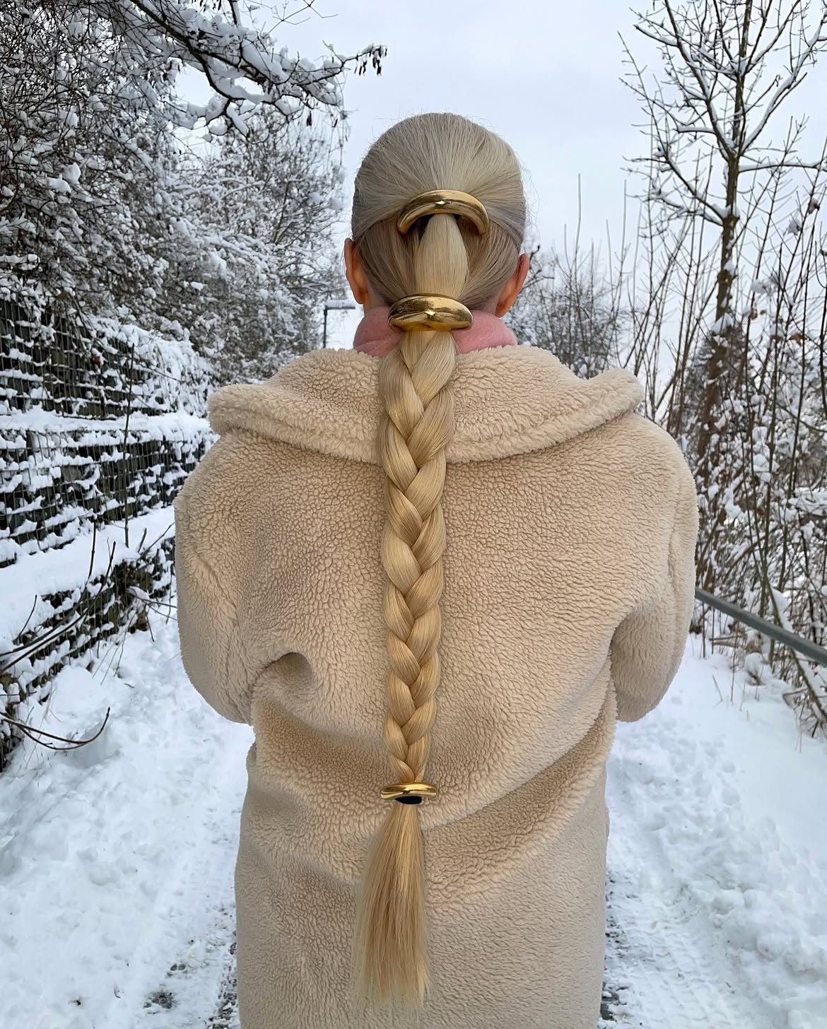 Chic Braided Ponytail With Gold Statement Accessories
