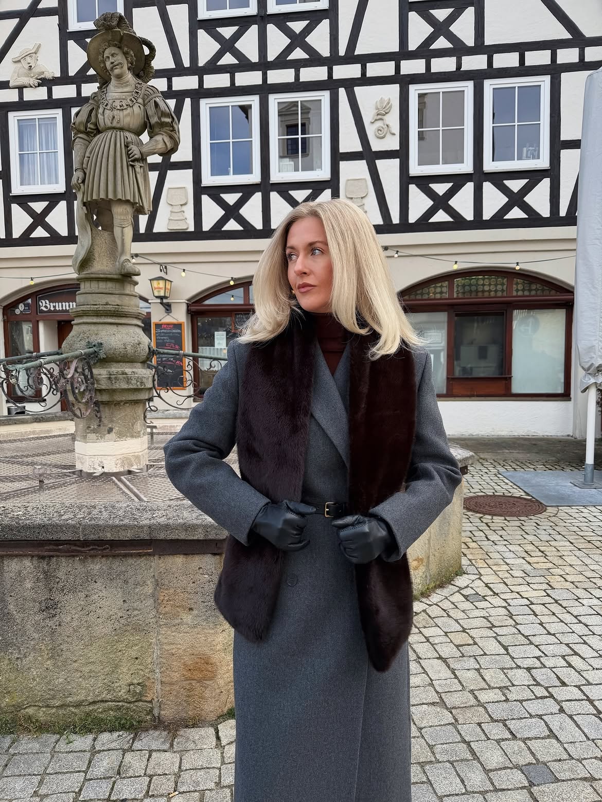 Chic Monochrome Ensemble With Rich Fur Accents