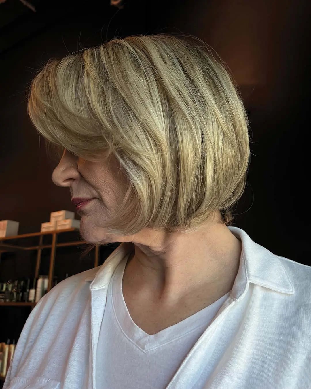Layered Bob With Side Swept Bangs, Ash Blonde Layered Bob With Side Swept Bangs, Ash Blonde — Chin Length Bob