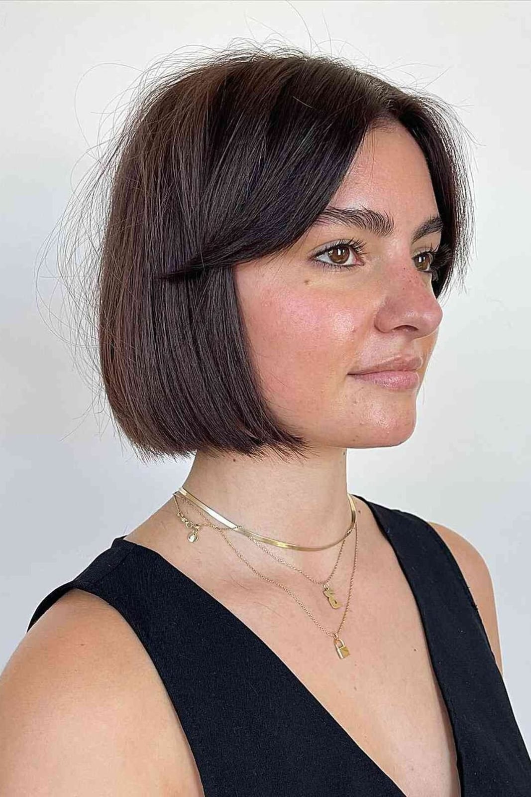 Dark Brown Bob With Blunt Bangs Dark Brown Bob With Blunt Bangs — Chin Length Bob