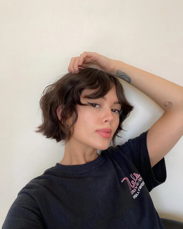Chin Length Bob With Wispy Bangs and Air Dried Texture Chin Length Bob With Wispy Bangs and Air Dried Texture — Choppy Bob Hairstyles