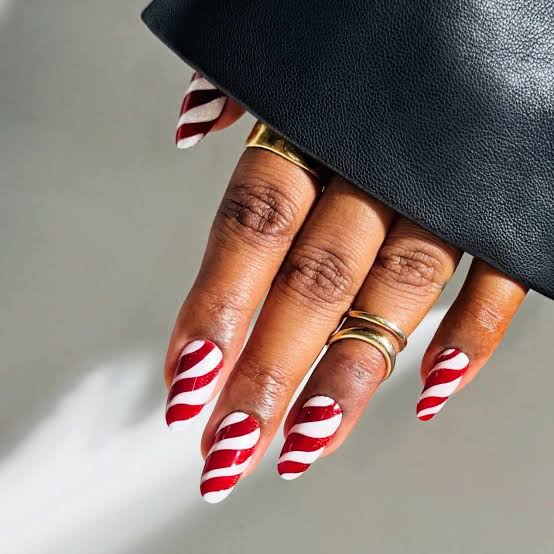 Medium Stiletto Red White Candy Cane Stripes Medium Stiletto Red White Candy Cane Stripes — Christmas Acrylic Nails