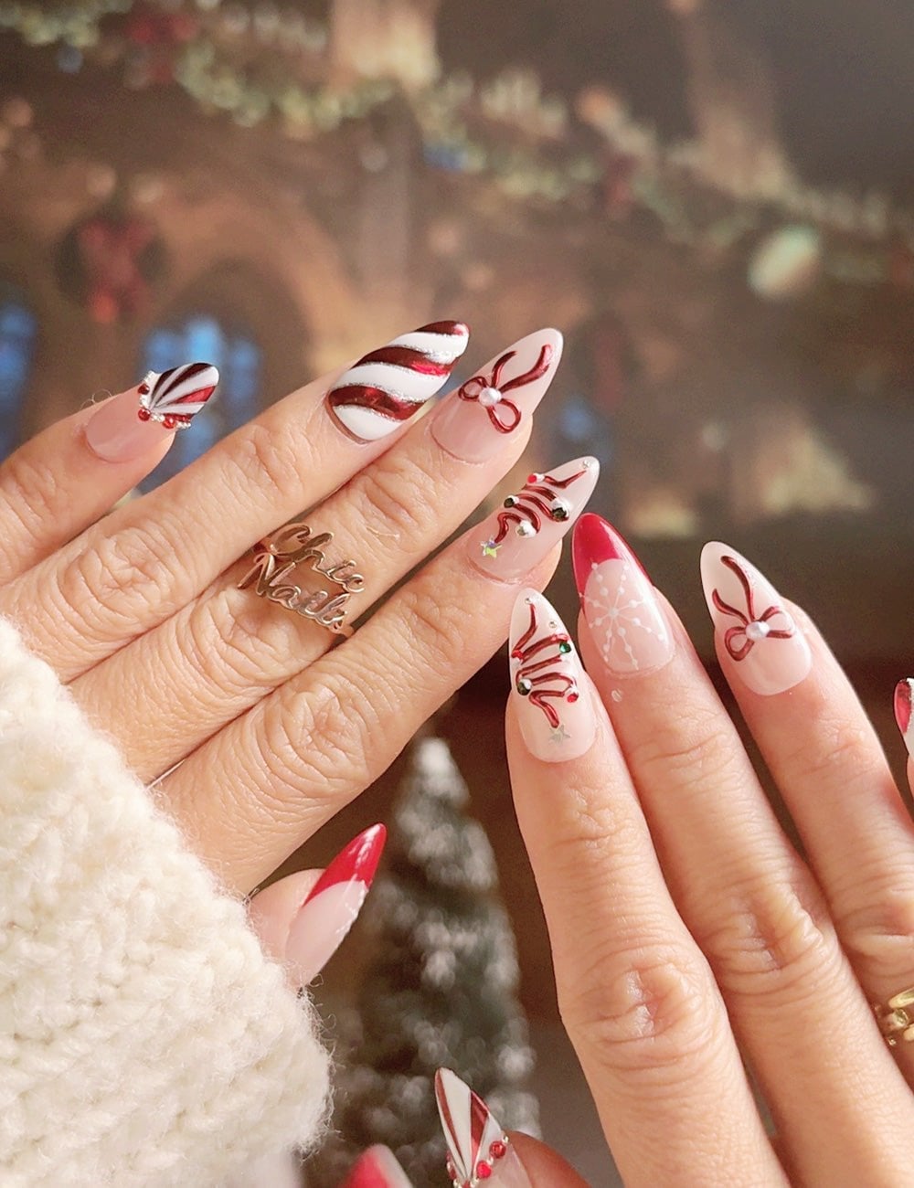 Medium Stiletto Almond Red White Candy Cane Reindeer, Glossy Medium Stiletto Almond Red White Candy Cane Reindeer, Glossy — Christmas Acrylic Nails