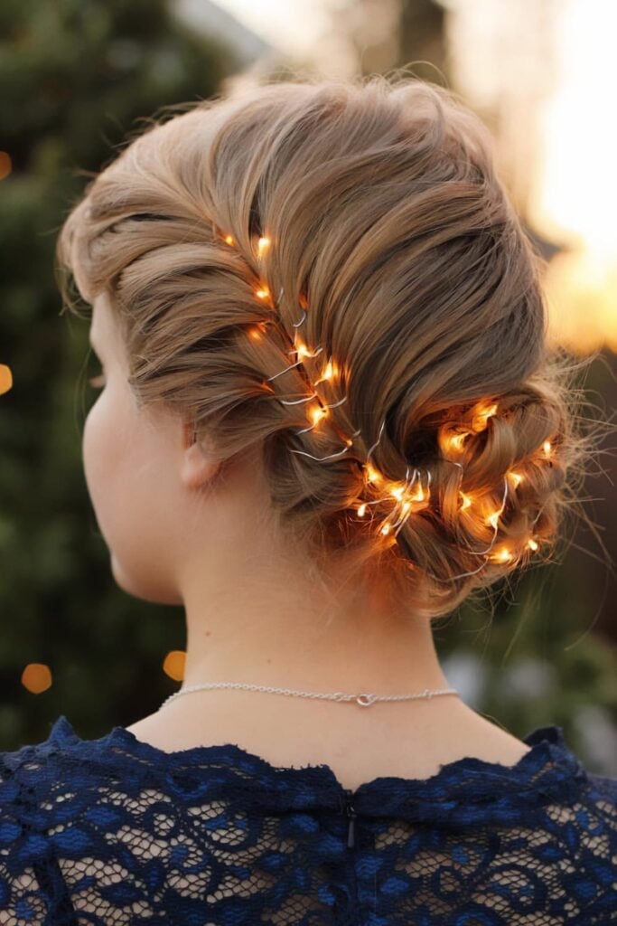 Elegant Blonde Updo With Fairy Lights — Christmas Hairstyles