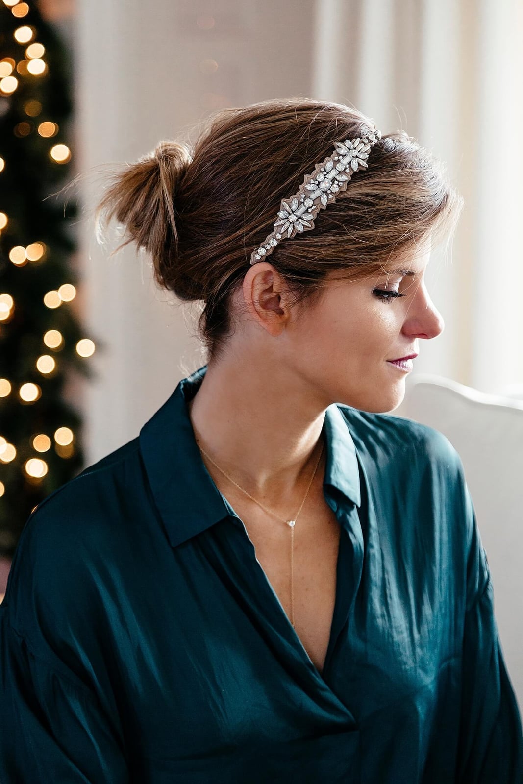 Brown Messy Bun With Jeweled Headband — Christmas Hairstyles