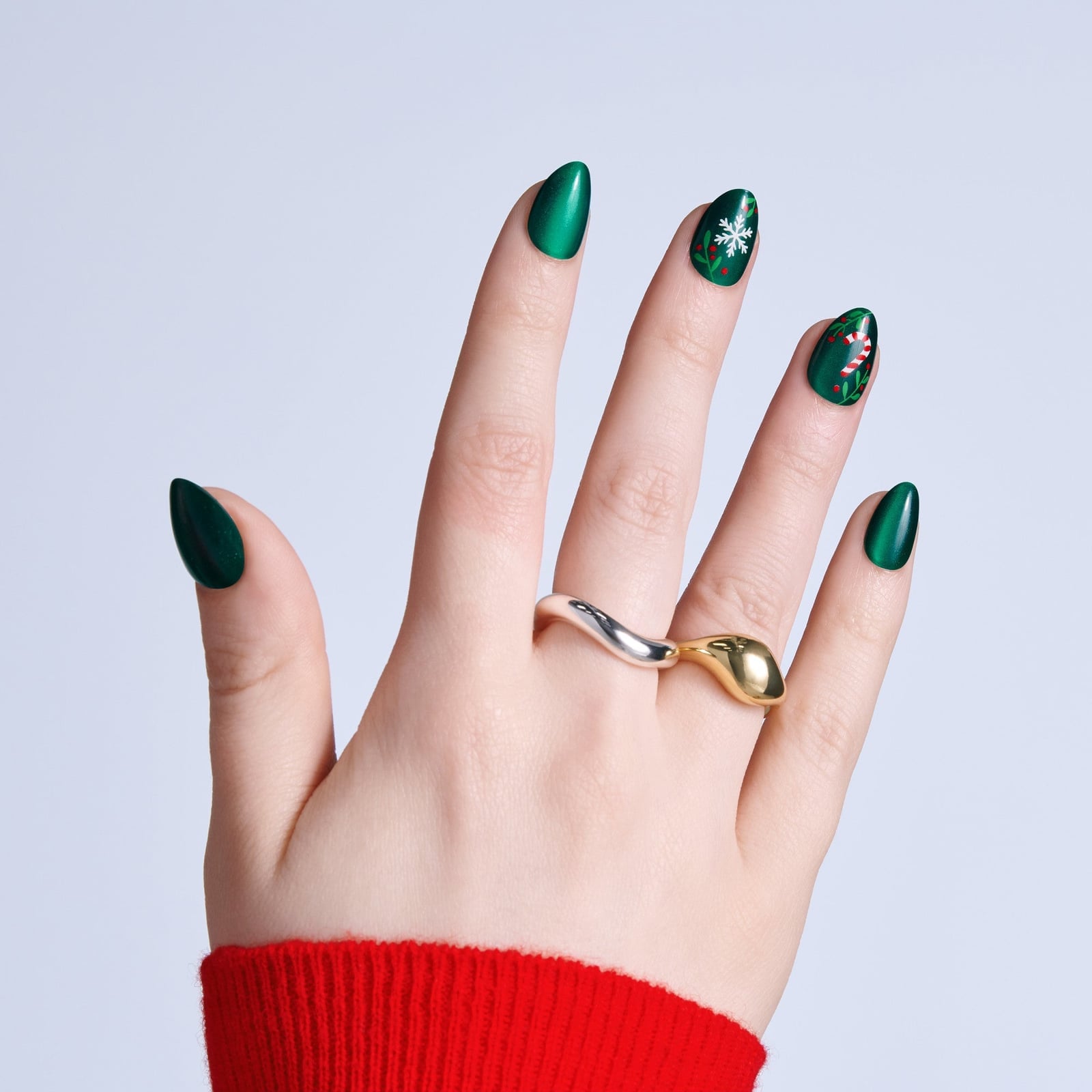 Emerald Green Snowflake and Candy Cane Almond Nails Emerald Green Snowflake and Candy Cane Almond Nails — Christmas Nails