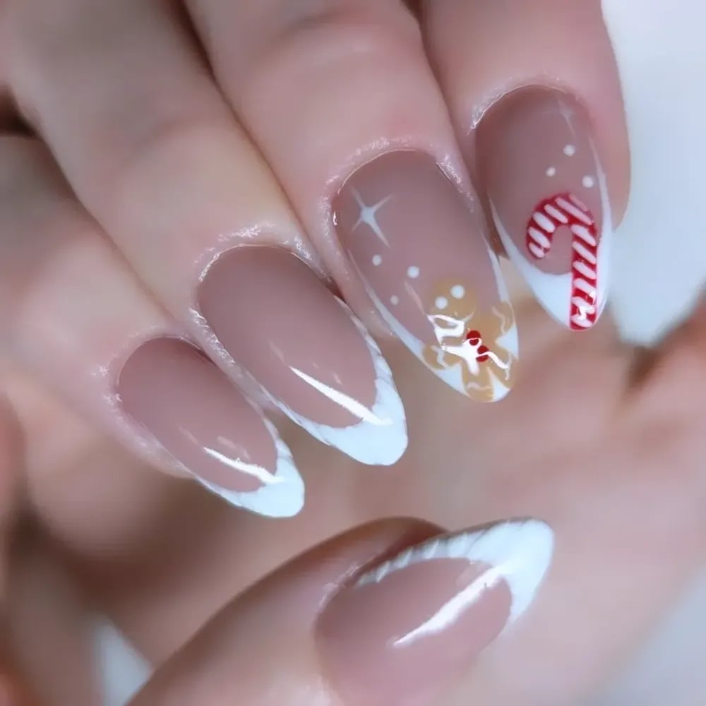Gingerbread Man Candy Cane Nude French Almond Nails Gingerbread Man Candy Cane Nude French Almond Nails — Christmas Nails