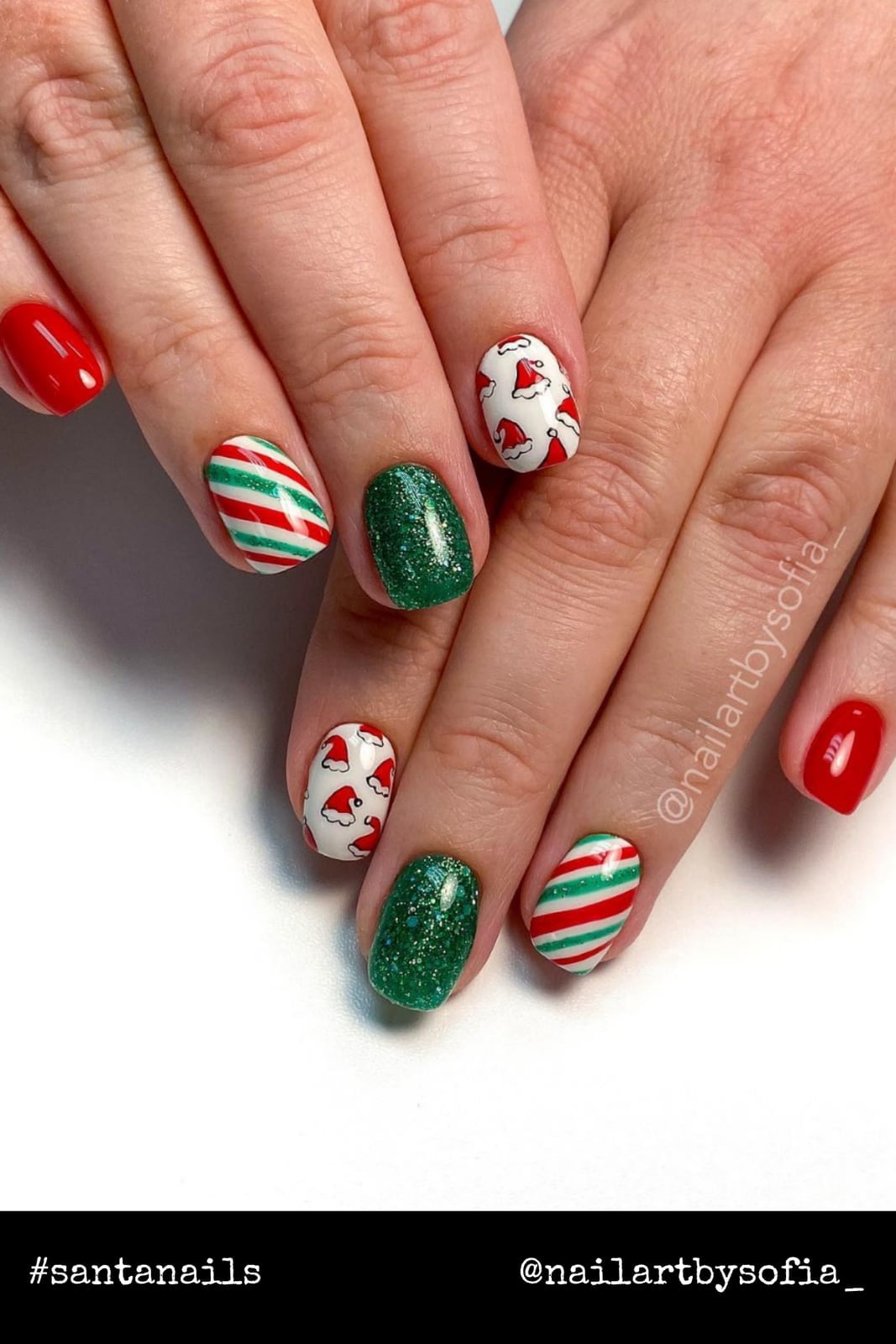Short Oval Santa Hat Stripe Nails Short Oval Santa Hat Stripe Nails — Christmas Nails Green and Red