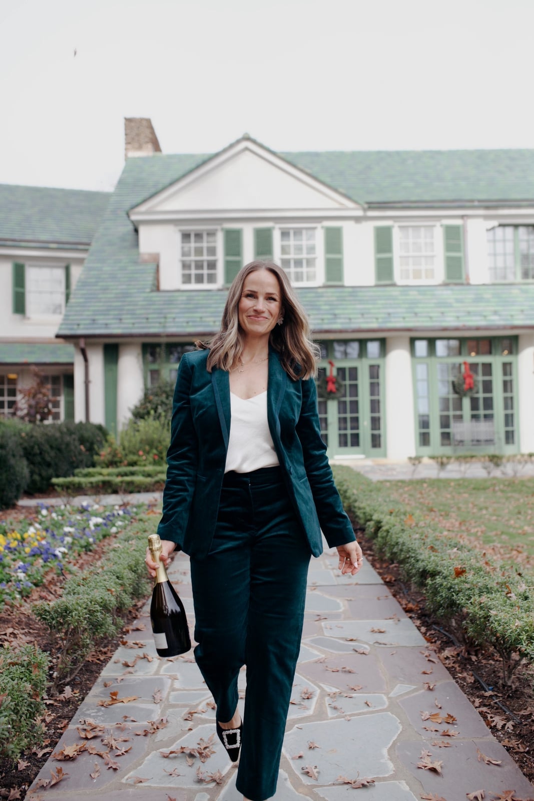 Deep Green Velvet Suit With White Silk Top, Black Pointed-Toe Flats — Christmas Party Outfits Casual