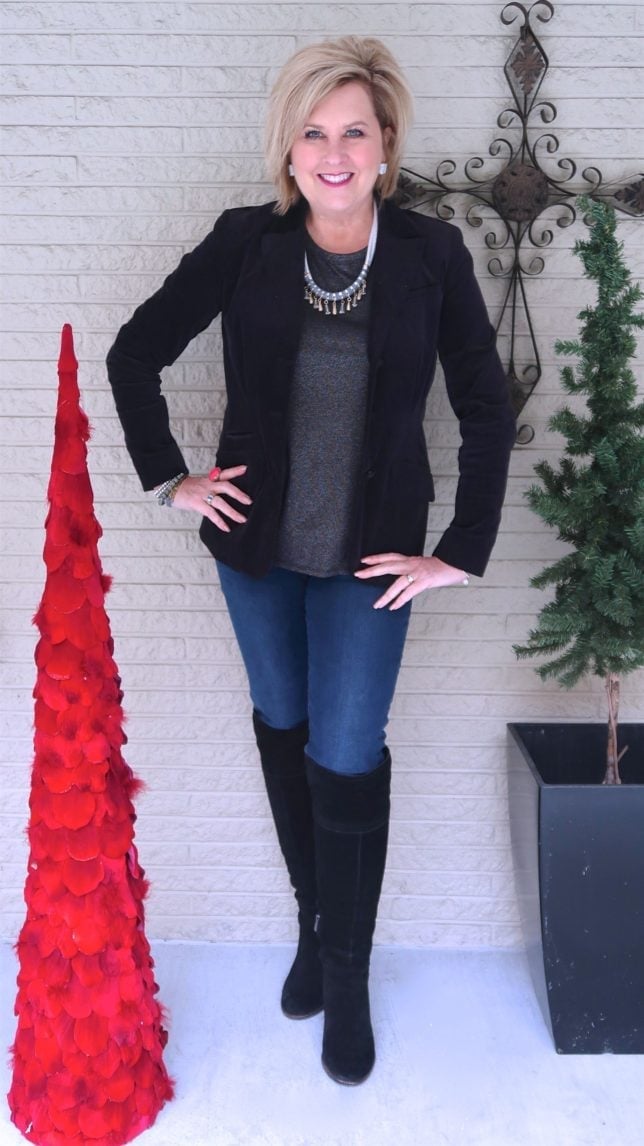 Black Velvet Blazer With Gray Top And Blue Jeans — Christmas Party Outfits Casual