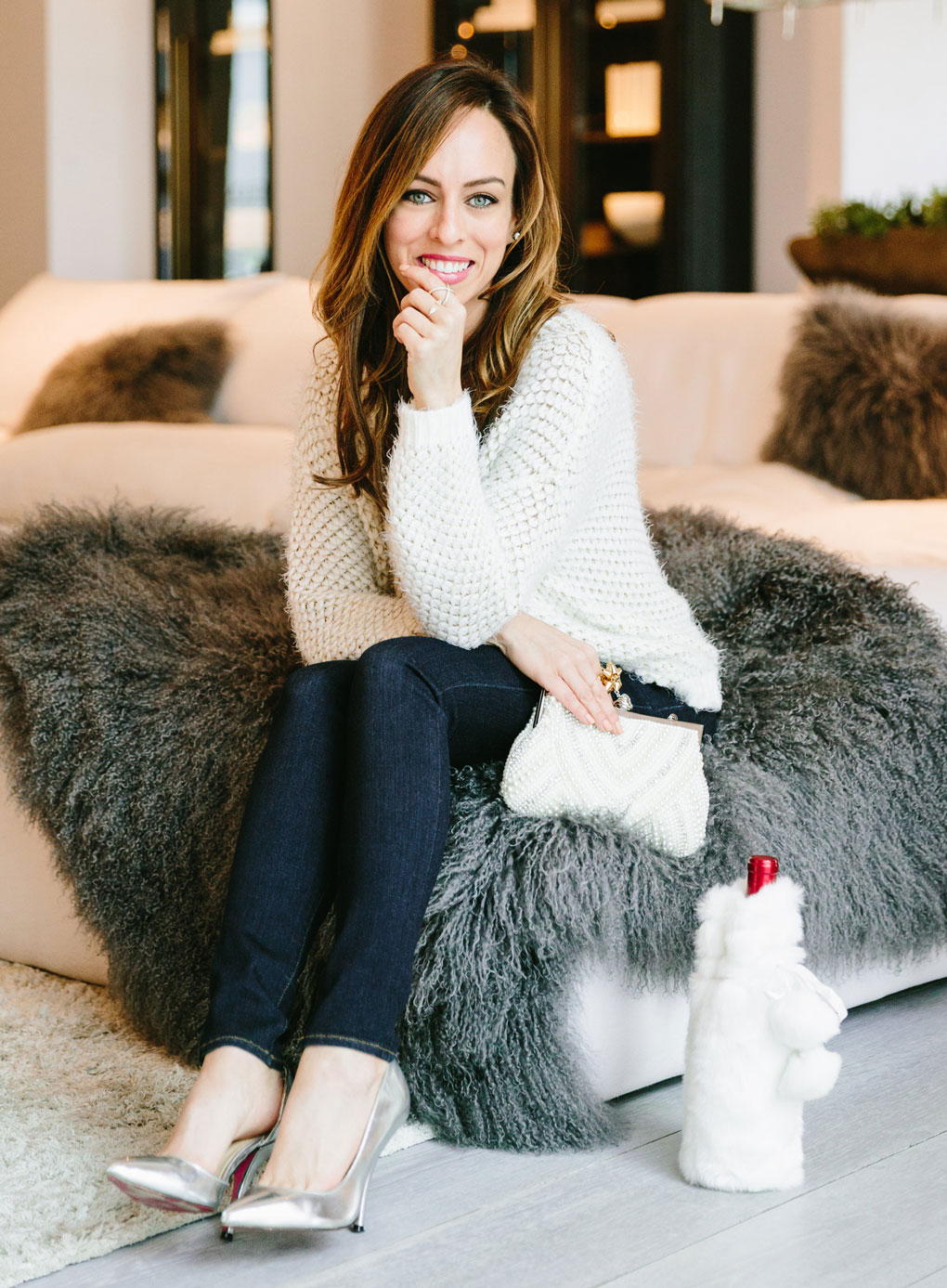 White Chunky Knit Sweater With Dark Blue Jeans — Christmas Party Outfits Casual