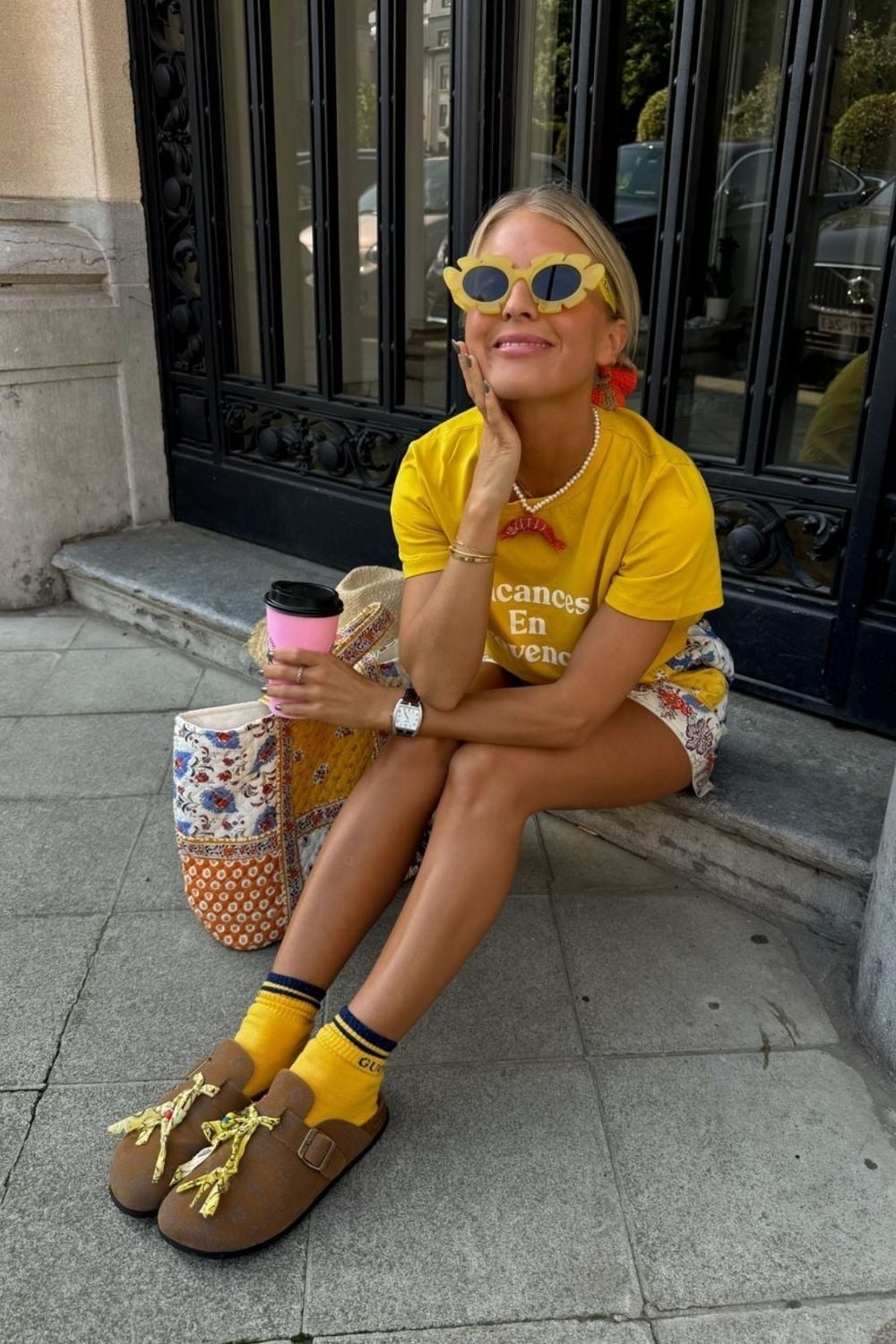 Brown Clogs with Yellow Socks and Patterned Shorts Brown Clogs with Yellow Socks and Patterned Shorts — Clogs Outfits