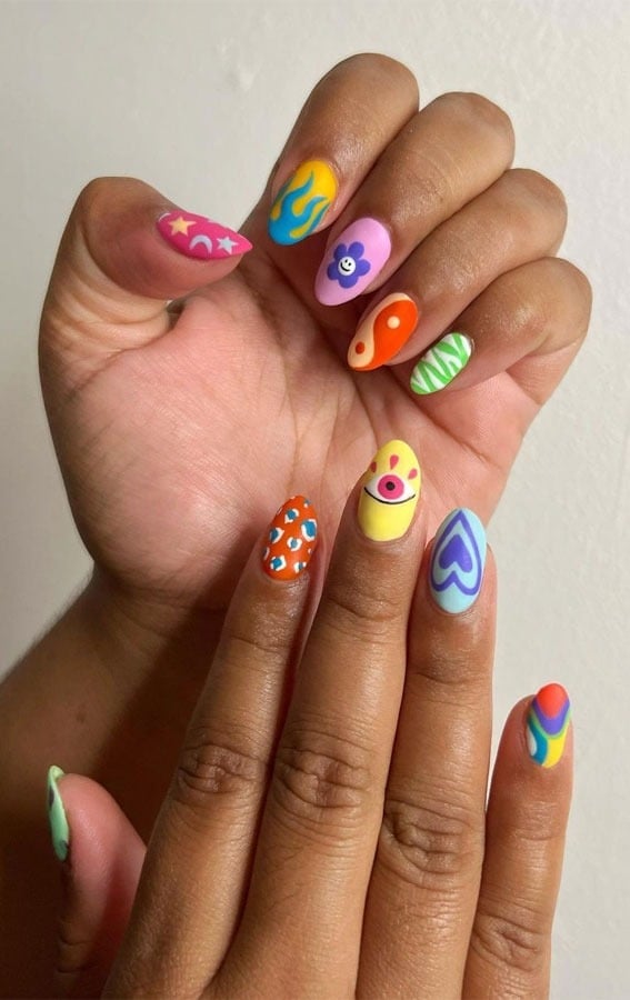 Playful Motifs Medium Almond Nails Playful Motifs Medium Almond Nails — Colorful Nails