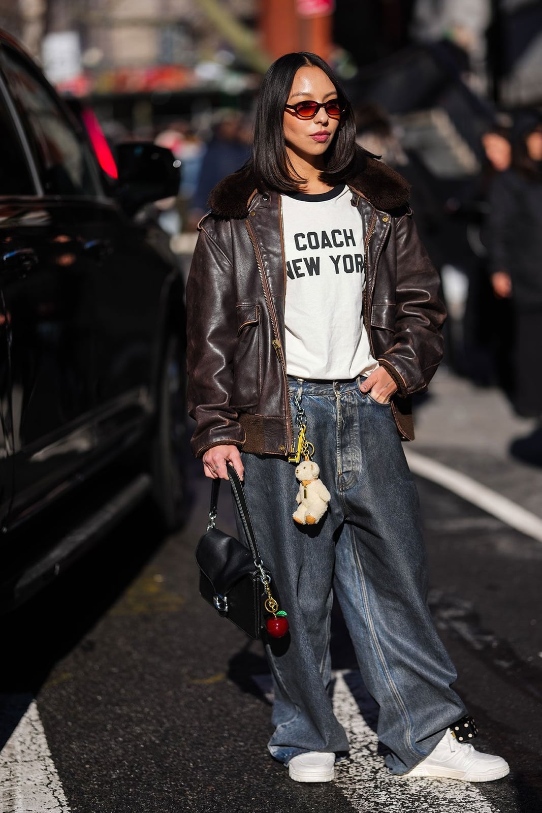Oversized Leather Jacket and Wide Leg Jeans, Office-Safe Version — Concert Outfits
