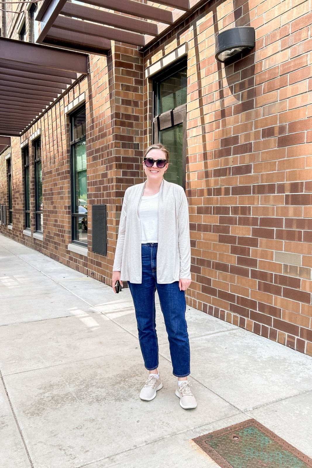 Light Gray Cardigan Over White T-Shirt and Jeans — Conference Outfits