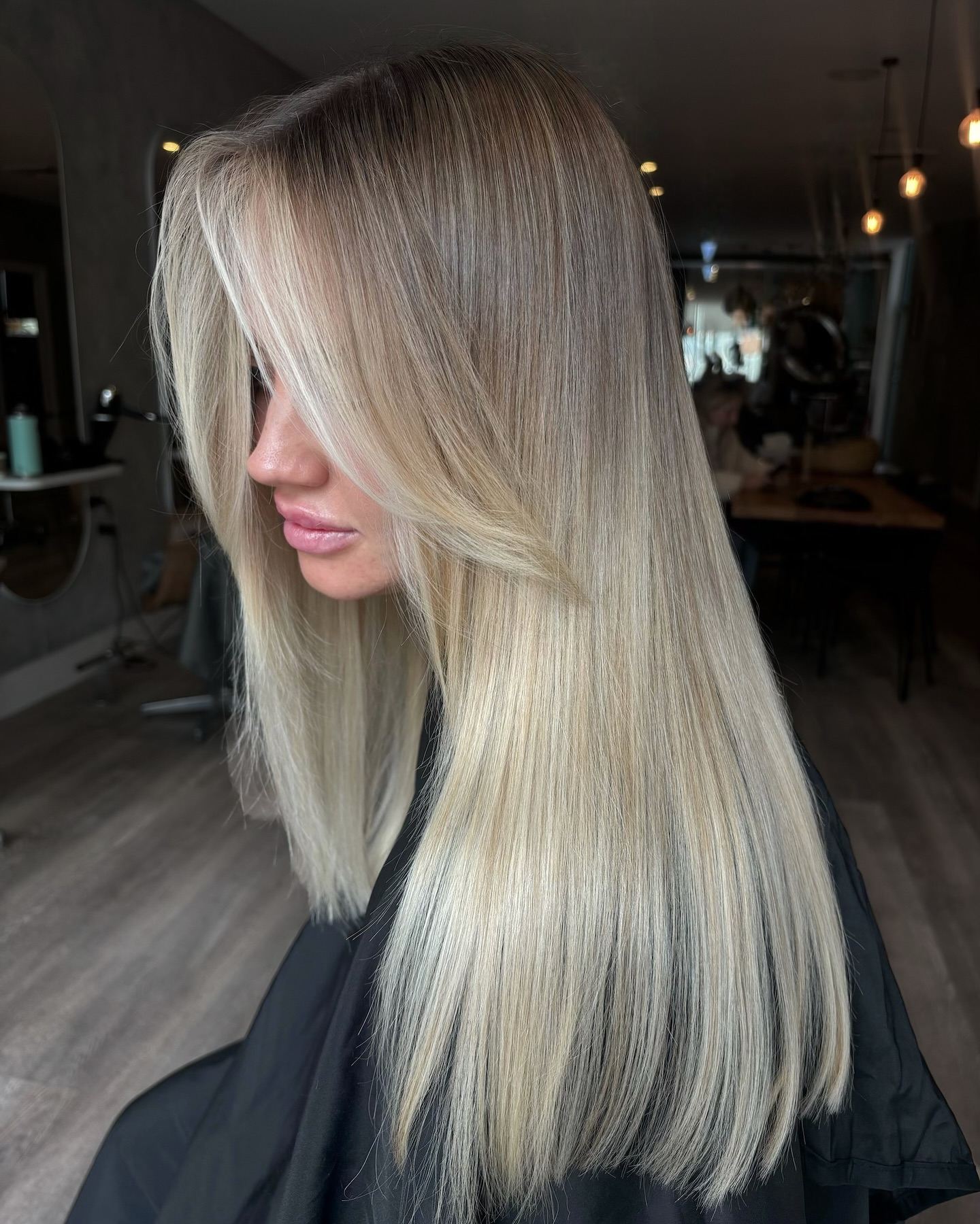 Cool Toned Platinum Blonde With Face Framing Layers