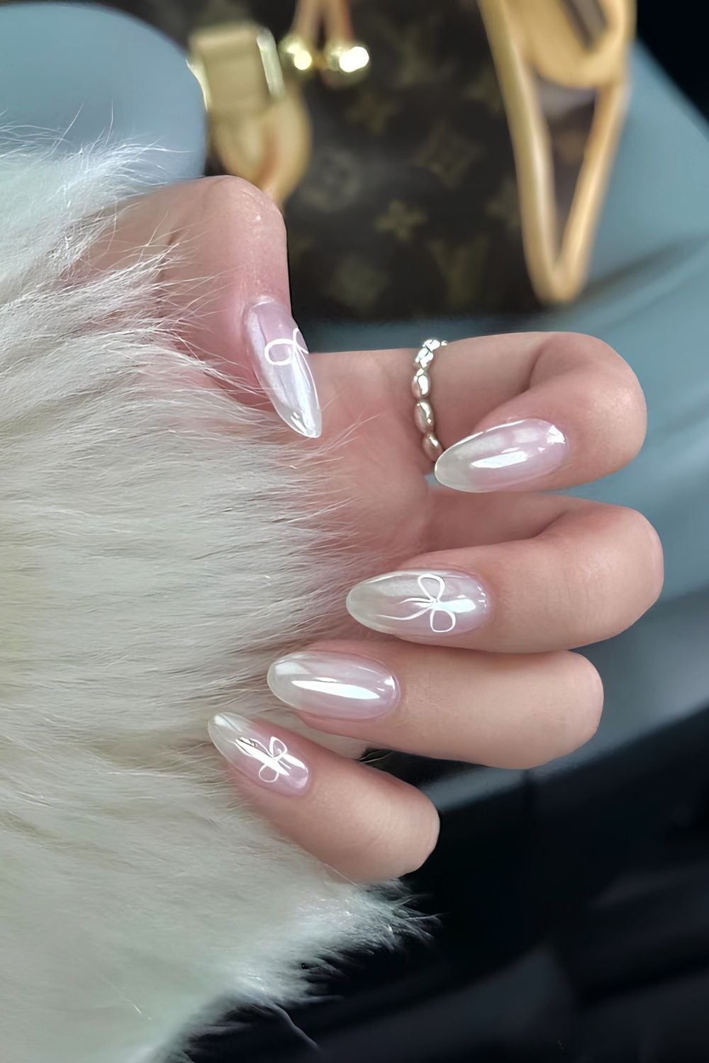 Long Oval Pearlescent Nails with White Bow Outline — Coquette Nails