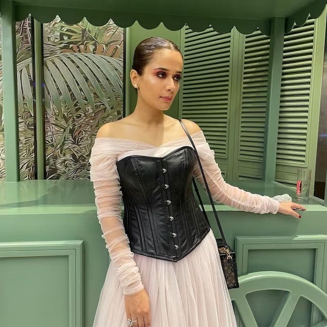 Leather Corset Over Knit Turtleneck Leather Corset Over Knit Turtleneck — Corset Outfits