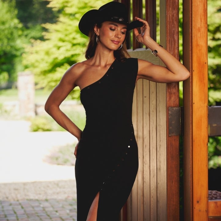 Black One-Shoulder Dress With Wide-Brimmed Hat — Country Concert Outfits Ideas