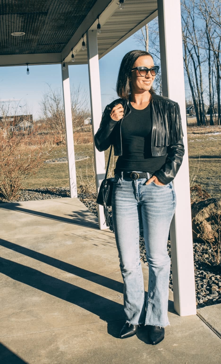 Fringed Leather Jacket With Bootcut Jeans — Country Concert Outfits Ideas
