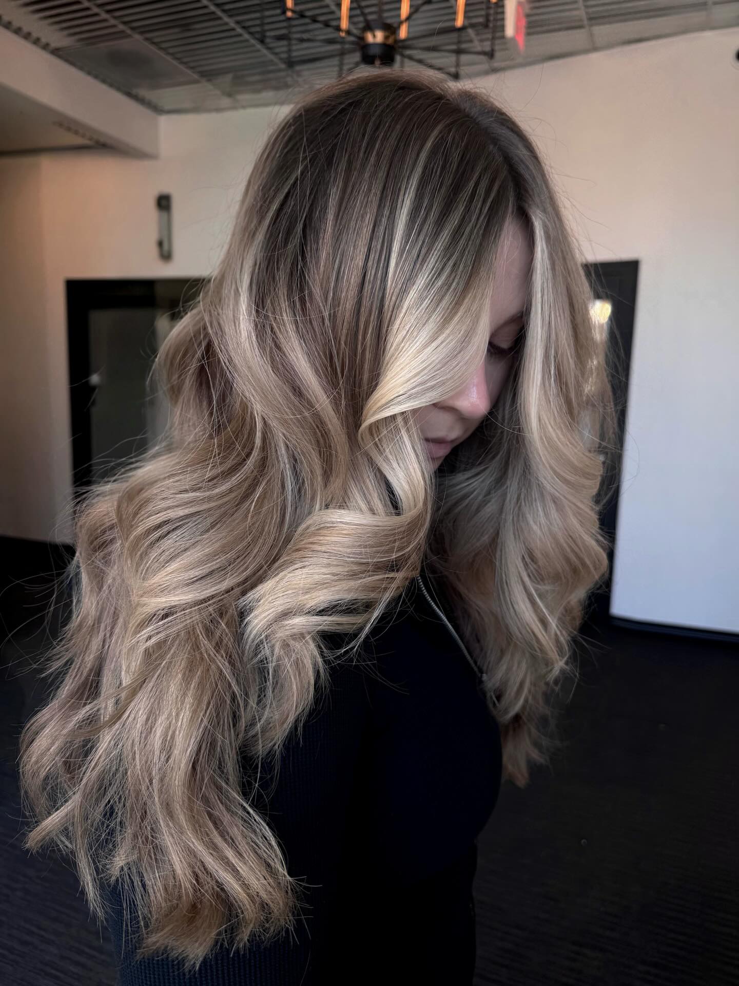 Creamy Blonde Balayage With Loose Waves