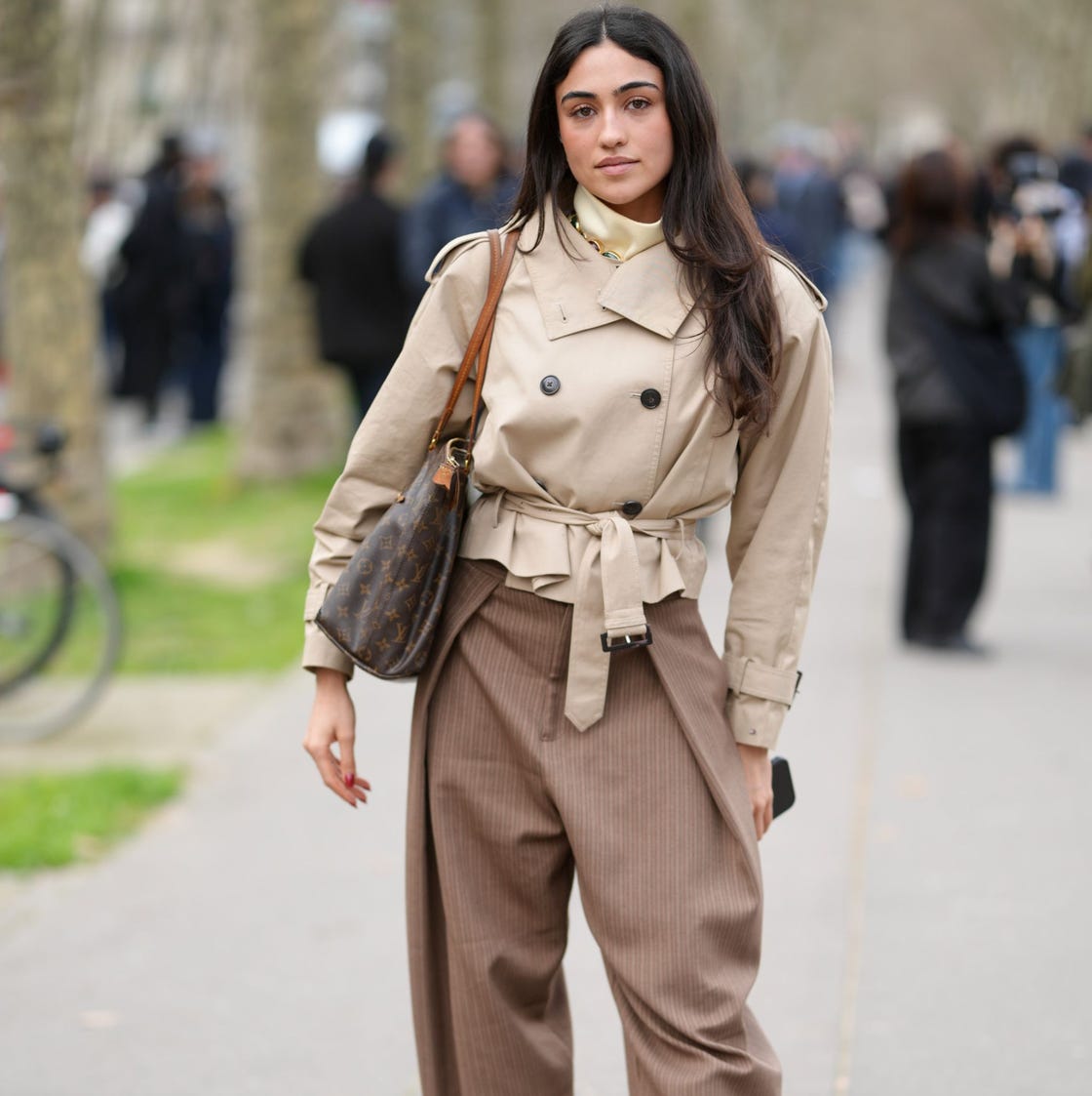 Beige Belted Cropped Trench Jacket With Cream Top And Brown Trousers — Cropped Jacket Outfits