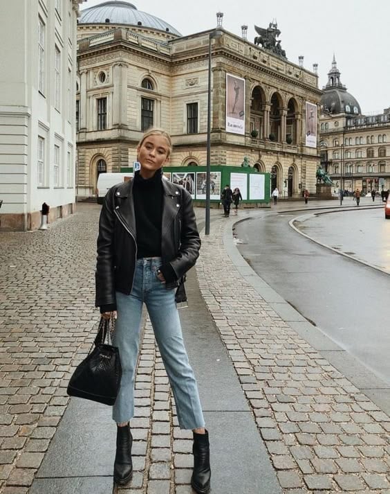 Black Leather Cropped Jacket Over Black Turtleneck With Light Blue — Cropped Jacket Outfits