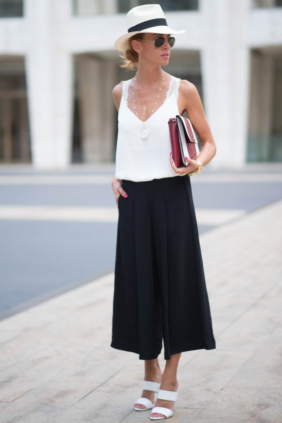 Black Wide-Leg Culottes with Lace Camisole, White Hat, and Red Clutch Black Wide-Leg Culottes with Lace Camisole, White Hat, and Red Clutch — Culottes Outfits
