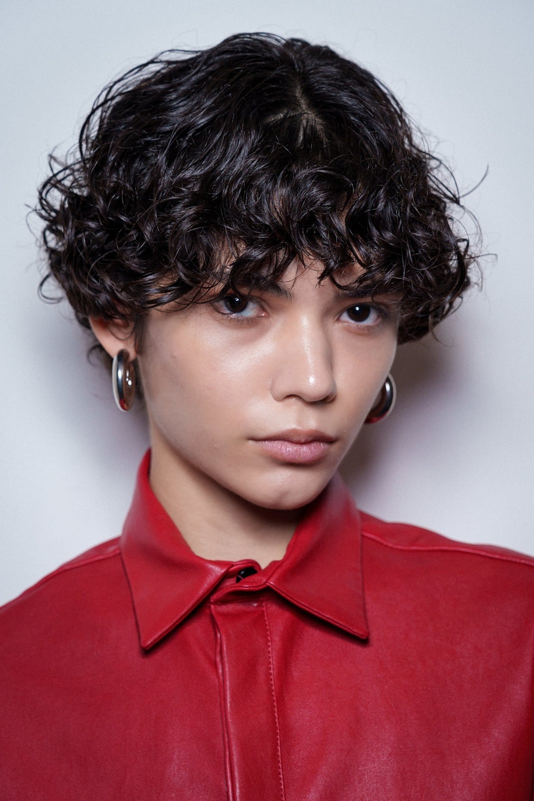 Short Curly Hair With Wispy Bangs — Curly Bangs