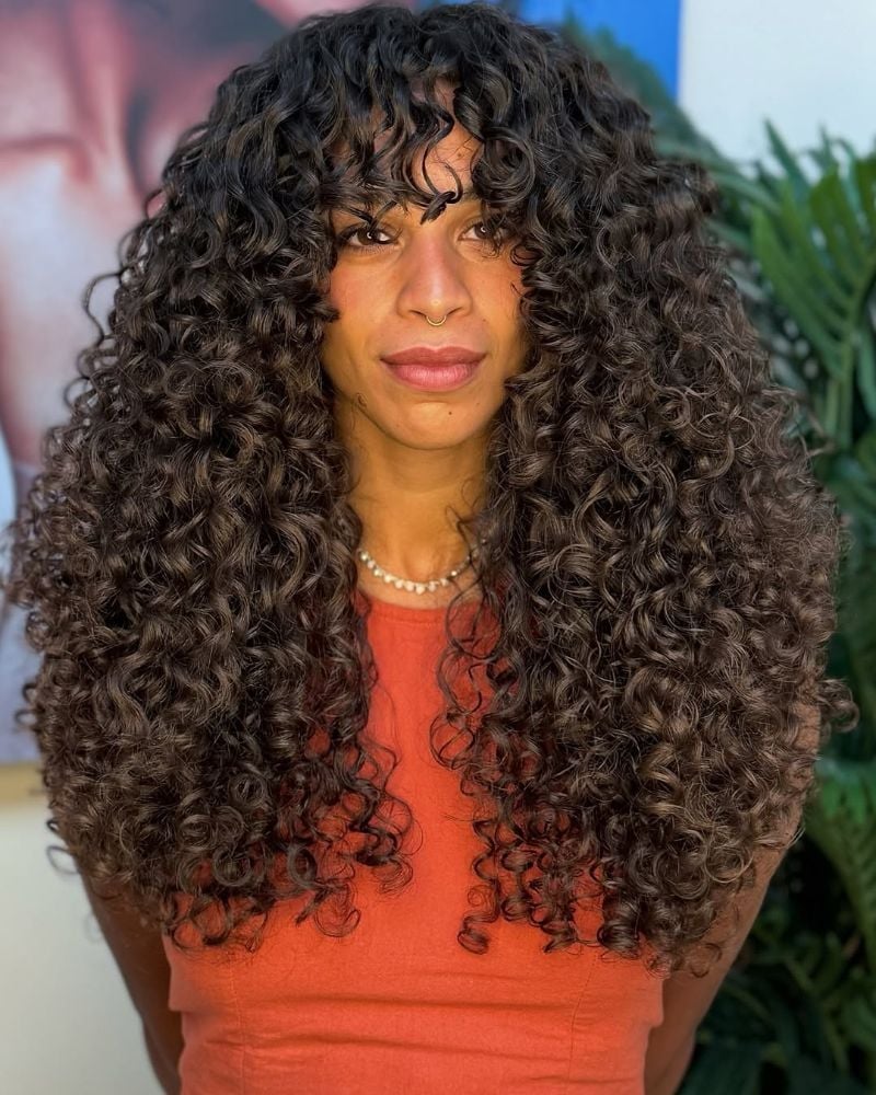 Mid-Back Dark Brown Hair With Face-Framing Layers — Curly Bangs