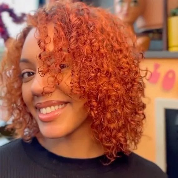 Copper Collarbone Cut With Curtain Bangs — Curly Bangs