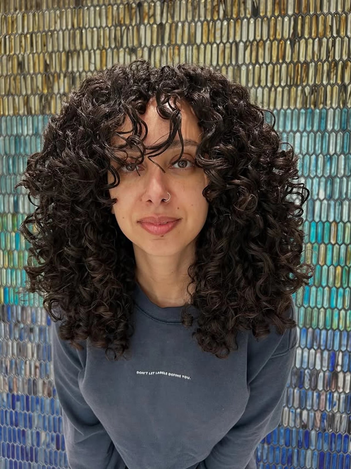 Dark Brown Collarbone Layers With Curtain Bangs — Curly Bangs