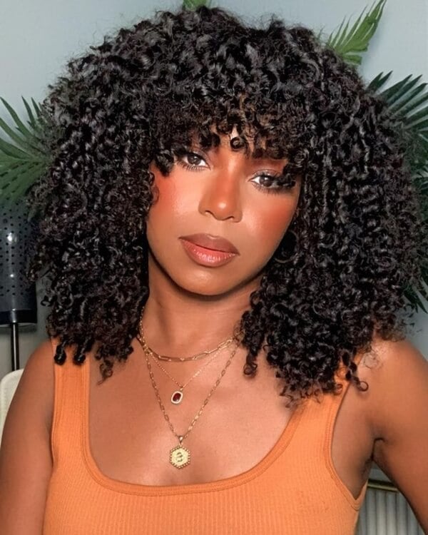 Collarbone Layered Cut With Full Fringe Collarbone Layered Cut With Full Fringe — Curly Hair